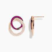 The Ruby Royale 14K Rose Gold Ruby and Diamond Intertwined Circles Earrings feature overlapping loops—one shimmering with diamonds, the other with vibrant rubies—for an elegant, interlocking design.