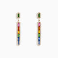 The Watercolors 14K Yellow Gold Multi Sapphire Drop Earrings feature vertically arranged rectangular multicolored sapphires bordered by clear stones for a stunning rainbow effect.