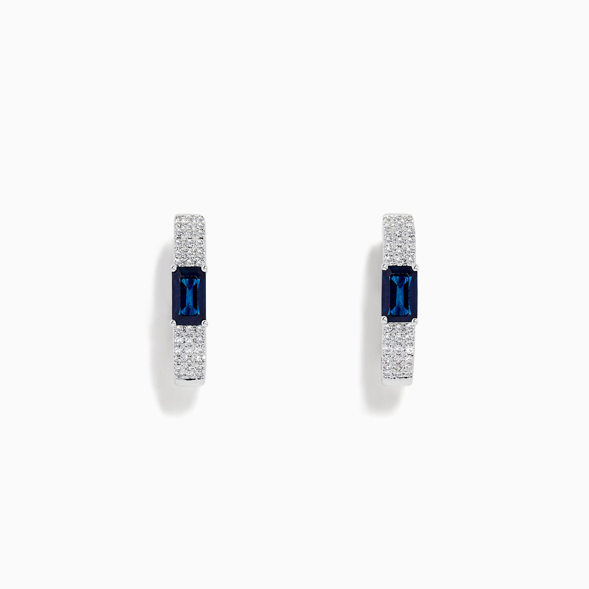 The Royale Bleu 14K White Gold Sapphire and Diamond Earrings feature a rectangular blue sapphire center accented by sparkling diamonds, presented against a plain white background.