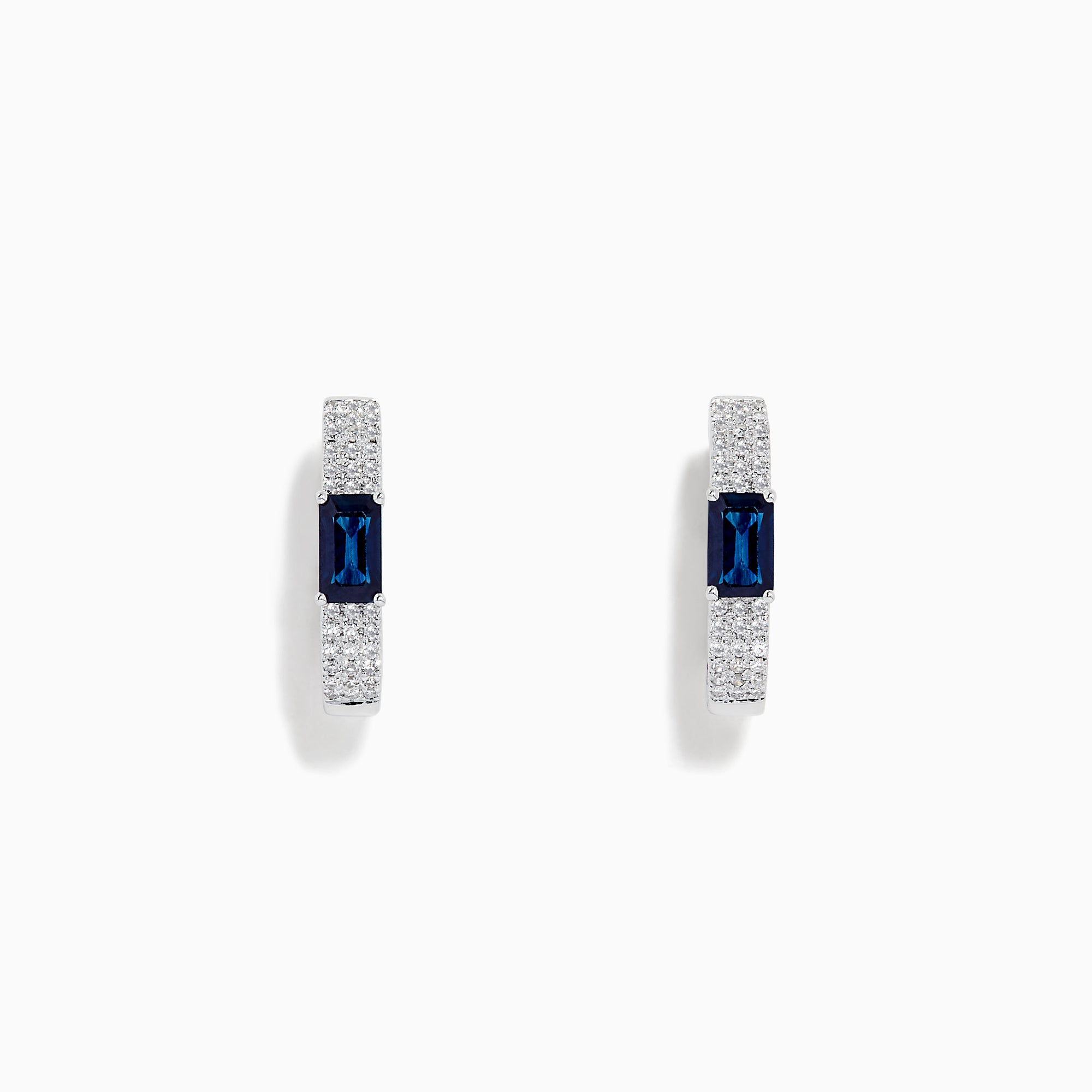 The Royale Bleu 14K White Gold Sapphire and Diamond Earrings feature a rectangular blue sapphire center accented by sparkling diamonds, presented against a plain white background.