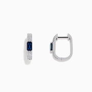 The Royale Bleu 14K White Gold Sapphire and Diamond Earrings feature a rectangular blue sapphire center accented by sparkling diamonds, presented against a plain white background.