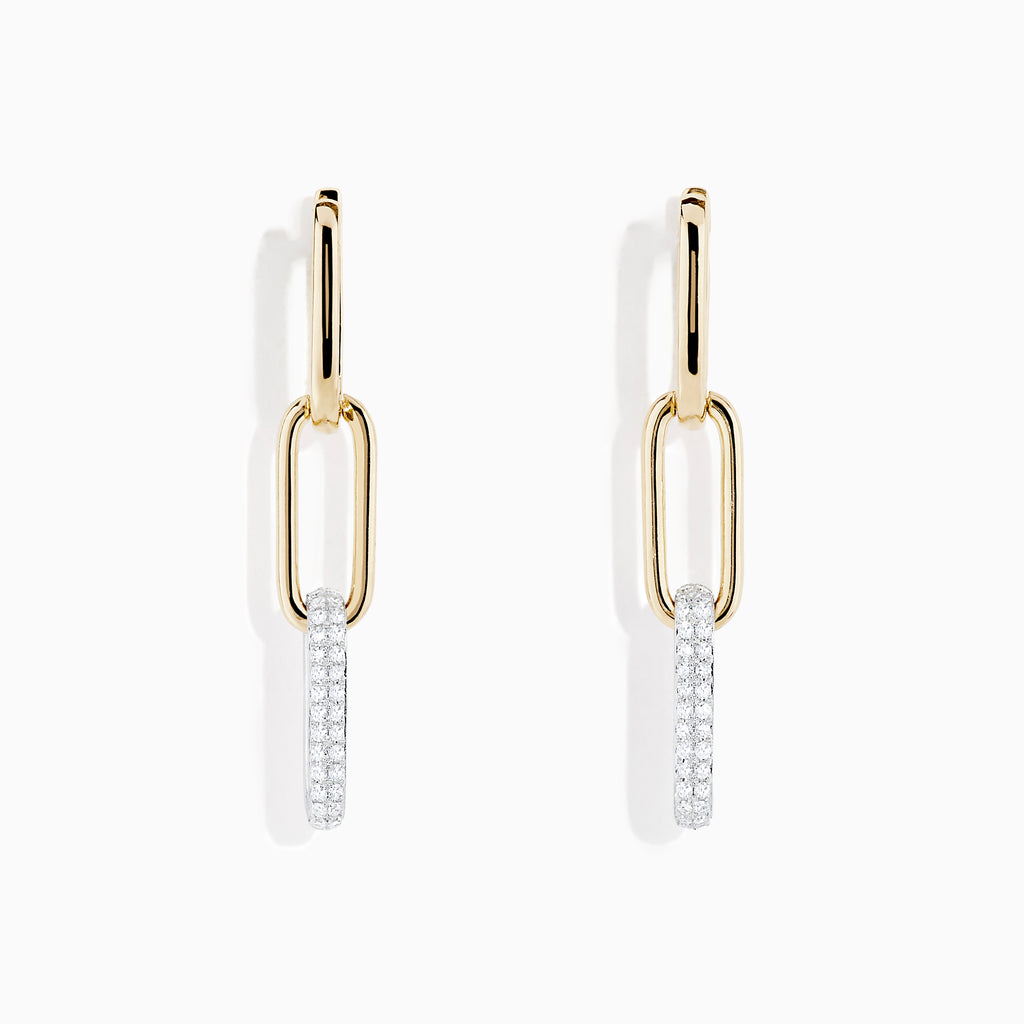 The Duo 14K Two Tone Gold Diamond Drop Earrings feature two linked ovals—one in gold and the lower adorned with sparkling diamonds—creating a modern, elegant look.