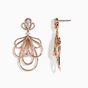 The Pave Rose 14K Gold Diamond Fashion Statement Earrings are elegant pieces crafted in 14K gold, featuring intricate designs and sparkling white diamonds for a stunning look.