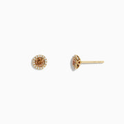 The 14K Yellow Gold White and Espresso Diamond Stud Earrings feature a cluster of espresso diamonds at the center, encircled by small clear stones, all set in yellow gold against a white backdrop.