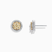 The Canare 14K Two Tone Gold Yellow Diamond Bouquet Halo Earrings feature a classic round design with a yellow diamond center and a halo of clear stones, totaling 0.98 carats.