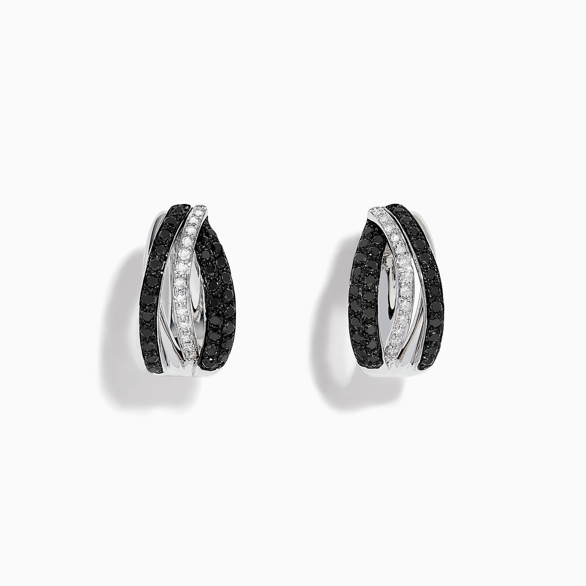 A pair of 14K White Gold White and Black Diamond Hoop Earrings featuring intertwined bands with black and clear stones, set against a white background.
