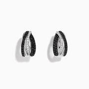 A pair of 14K White Gold White and Black Diamond Hoop Earrings featuring intertwined bands with black and clear stones, set against a white background.