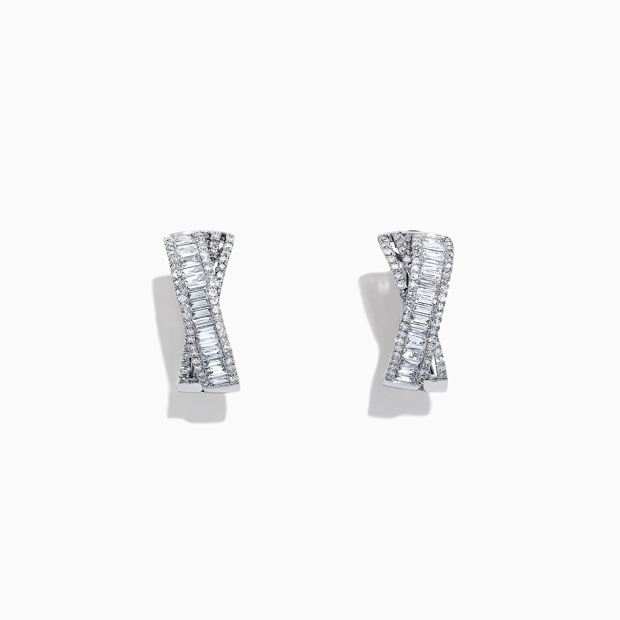 The Classique 14K White Gold 5/8 Diamond Hoop Earrings feature a twisted rectangular design with sparkling baguette-cut diamonds in geometric patterns, totaling 1.06 TCW, and are displayed against a white background.