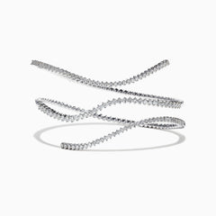 The Pave Classica 14K White Gold Diamond Wrap Bracelet, 3.43 TCW, coils elegantly in midair against a white background, casting a soft shadow and showcasing round-cut diamonds set closely along its length.