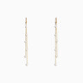 14K Yellow Gold Cultured Fresh Water Pearl Fringe Earrings featuring three delicate gold chains with spaced pearls, displayed on a plain white background.
