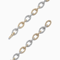 The Duo 14K 2 Tone Gold Diamond Link Tennis Bracelet, 1.52 TCW, features alternating oval links in gold and silver tones, each adorned with sparkling diamonds, displayed on a white background.
