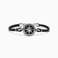 The Mens Sterling Silver Onyx Compass Leather Bracelet, 4.00 TCW, features a black cord with a round sterling silver compass rose charm, silver accents, and a clasp, shown on a white background.