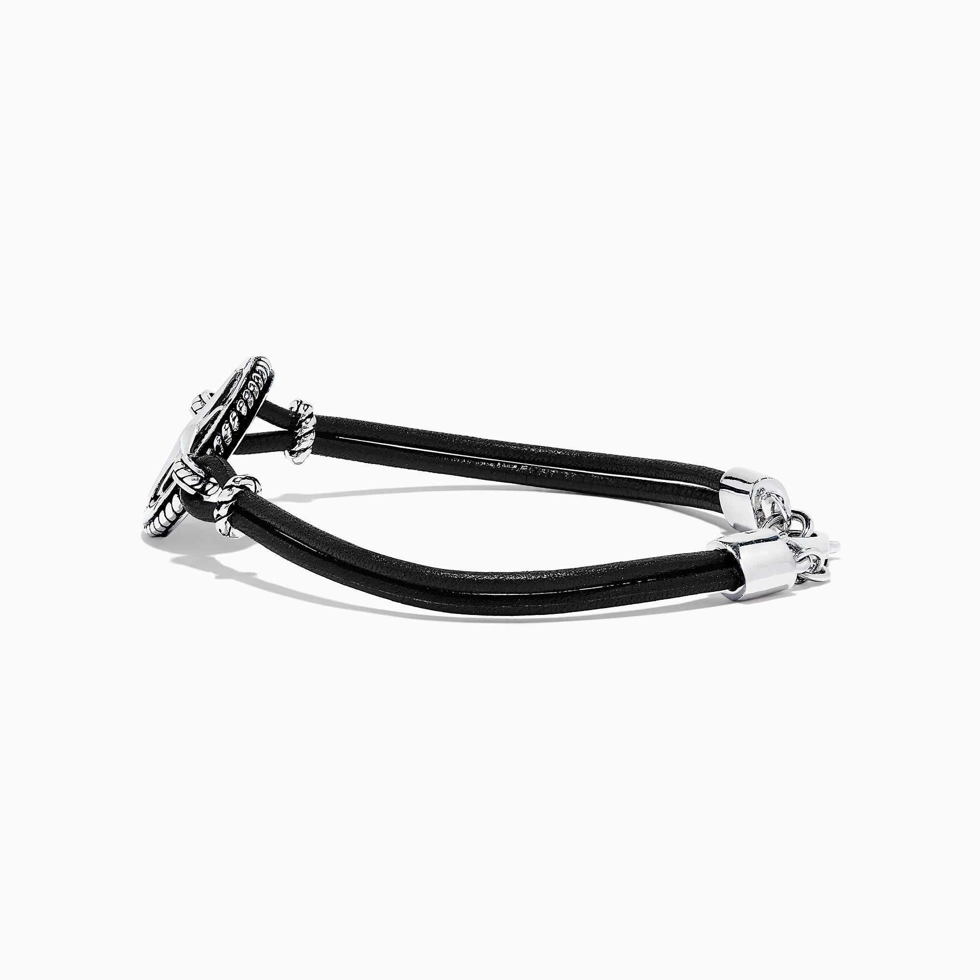 The Mens Sterling Silver Onyx Compass Leather Bracelet, 4.00 TCW, features a black cord with a round sterling silver compass rose charm, silver accents, and a clasp, shown on a white background.