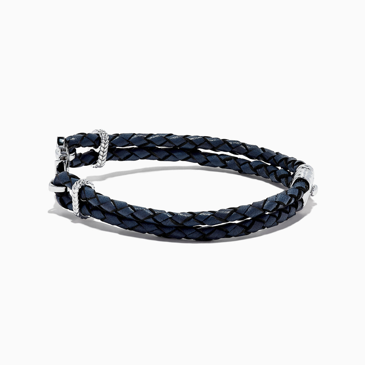 The Mens Sterling Silver Woven Leather Sapphire Anchor Bracelet, 0.52 TCW, features navy blue braided leather and a sterling silver anchor clasp set with sapphire gemstones.