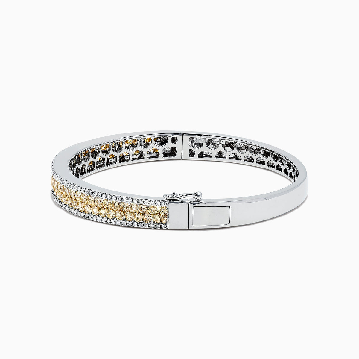 The Canare 14K Gold Yellow and White Diamond Bangle, 3.40 TCW, showcases a central row of yellow and white diamonds in an elegant geometric design inspired by Effy—an eye-catching gold statement piece.