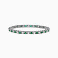 The Brasilica 14K White Gold Emerald and Diamond Tennis Bracelet, 4.78 TCW, showcases alternating emeralds and diamonds, set in polished white gold, displayed on a white background.