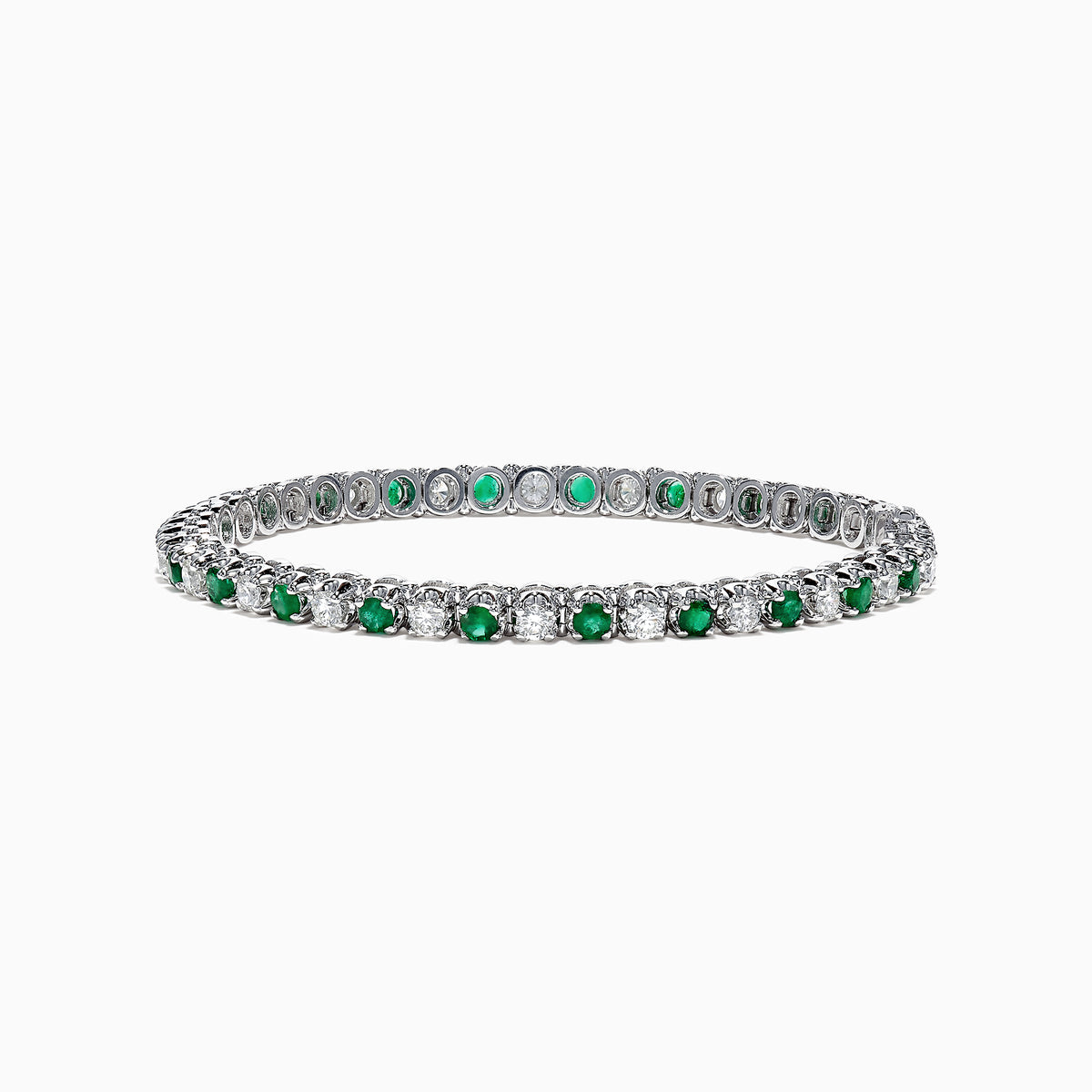 The Brasilica 14K White Gold Emerald and Diamond Tennis Bracelet, 4.78 TCW, showcases alternating emeralds and diamonds, set in polished white gold, displayed on a white background.