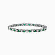 The Brasilica 14K White Gold Emerald and Diamond Tennis Bracelet, 4.78 TCW, showcases alternating emeralds and diamonds, set in polished white gold, displayed on a white background.