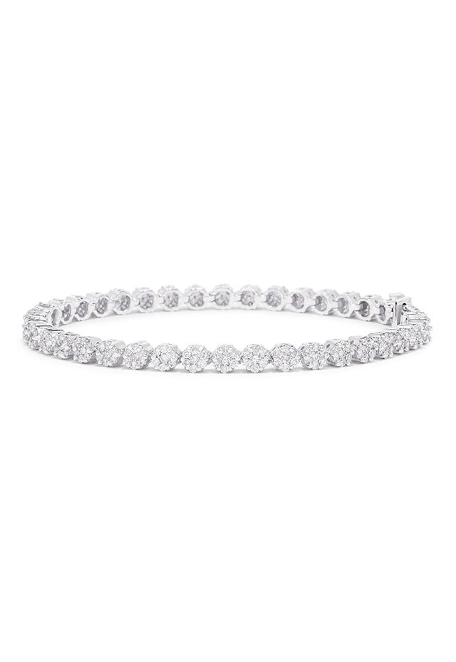 The Bouquet 14K White Gold Diamond Flower Tennis Bracelet features 3.14 TCW of sparkling diamonds in a sleek, continuous floral design.