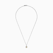 The Canare 18K Two-Tone Gold Cushion Cut Yellow Diamond Pendant (0.52 TCW) features a yellow diamond in a cushion cut, haloed by clear stones and suspended from a fine two-tone gold chain.