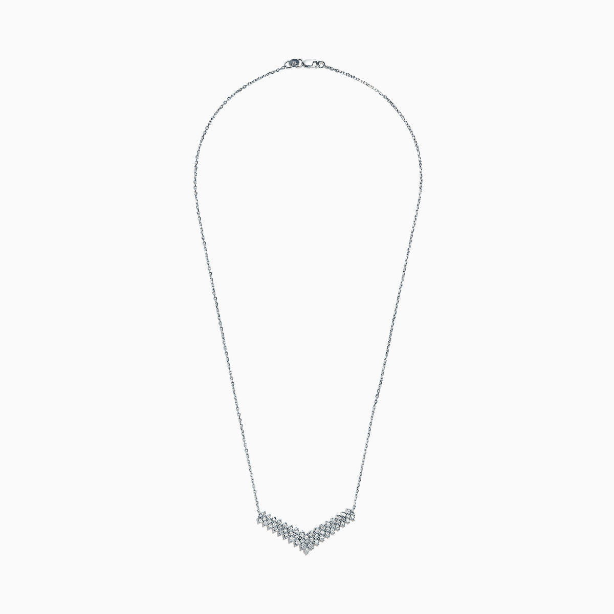 The 925 Sterling Silver Diamond Necklace features a V-shaped pendant with two rows of round diamonds, set at the chain’s base for maximum brilliance and a total carat weight of 0.47 TCW.