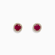 Ruby Royale 14K Yellow Gold Round Diamond Halo Ruby Stud Earrings, 1.27 TCW, feature vibrant red rubies at the center of each stud, surrounded by a sparkling diamond halo, all set against a plain white background.