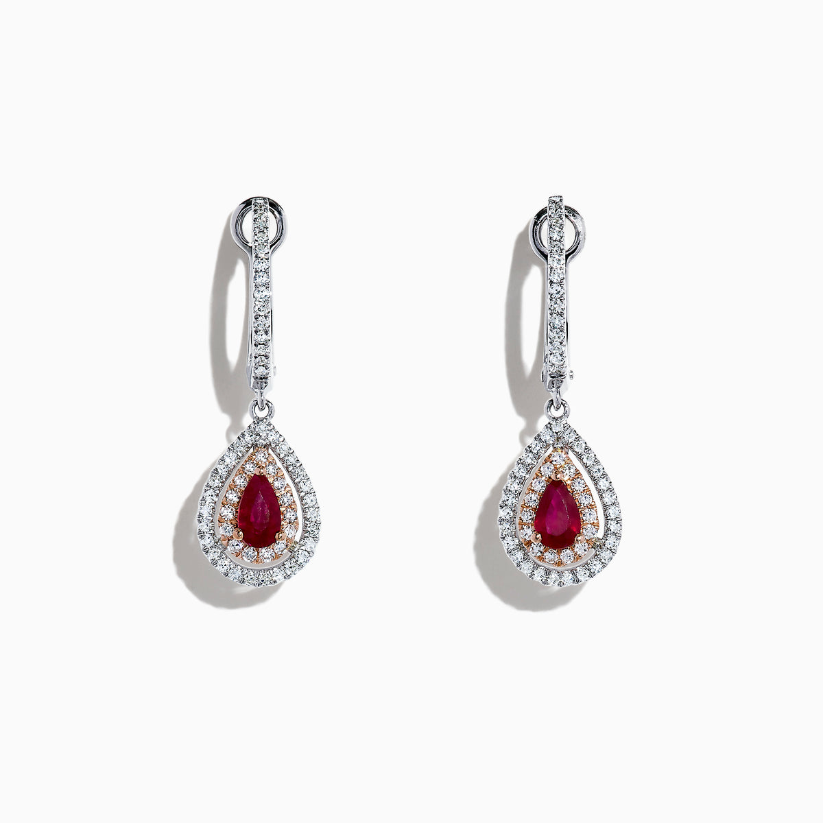 Ruby Royale 14K Two Tone Gold Pear Shaped Ruby Drop Earrings, 0.87 TCW, feature pear-shaped red rubies surrounded by two rows of white diamonds and diamond accents on the hooks, set in gold and shown on a white background.