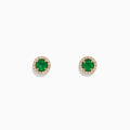 The Brasilica 14K Yellow Gold Emerald and Diamond Stud Earrings (1.08 TCW) feature round emerald centers encircled by a halo of clear diamonds, shown against a plain white background.