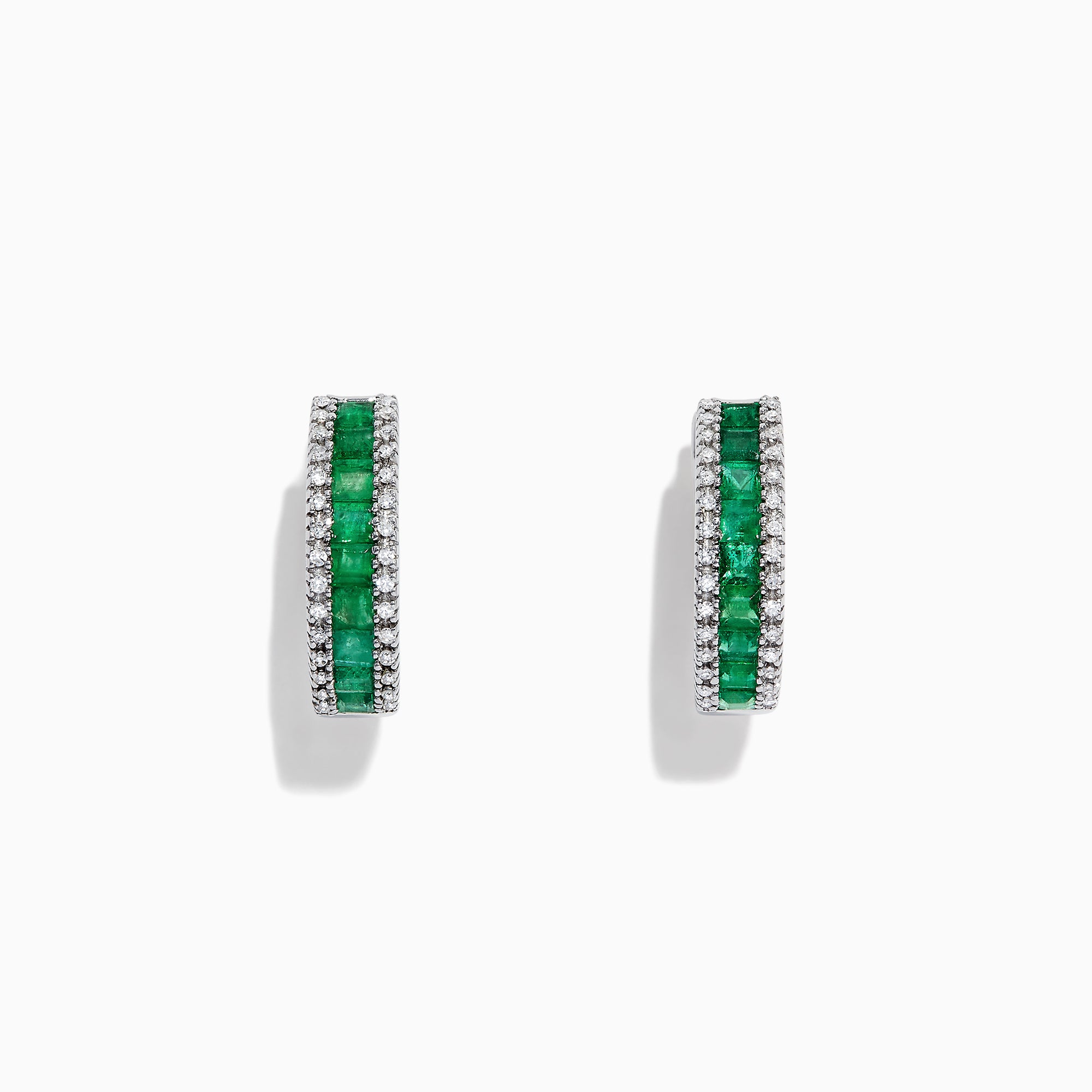 The Brasilica 14K White Gold Emerald and Diamond Hoop Earrings, 2.04 TCW, feature a central row of green emeralds bordered by white diamonds, all set in white gold and displayed against a white background.