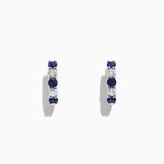 The Royale Bleu 14K Gold Sapphire and Diamond Hoop Earrings (1.19 TCW) feature alternating round sapphires and diamonds set in white gold, shown against a plain white background.