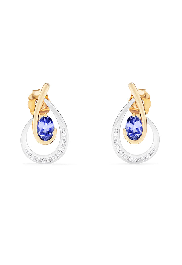Elegant 14K two-tone gold earrings featuring a central oval tanzanite and a row of diamonds along the lower swirl, totaling 1.03 carats.