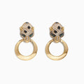 The Signature 14K Yellow Gold Diamond Emerald Panther Earrings, 0.93 TCW, feature leopard head designs with sparkling diamonds and green emerald eyes, each holding a smooth gold hoop in its mouth.