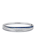 The Royale Bleu 14K White Gold Blue Sapphire & Diamond Bangle features a single row of blue sapphires and diamonds, totaling 1.47 TCW, set along the center for sleek elegance.