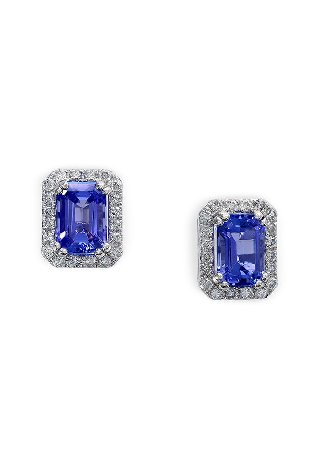 A pair of 14K white gold earrings featuring rectangular tanzanite gemstones (1.96 TCW) surrounded by sparkling diamonds, set in a silver-toned finish against a white background.