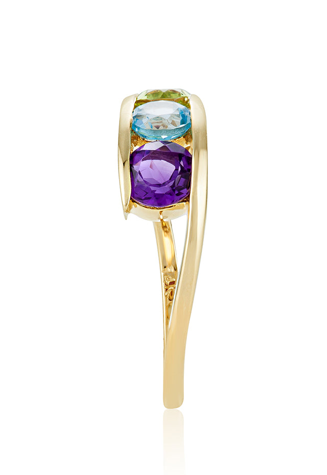 The Mosaic 14K Yellow Gold Multi Gemstone Ring, 1.33 TCW, showcases five vibrant round gemstones—purple, blue, green, yellow, and red—set in a row across the top.