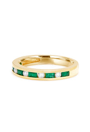 The Brasilica 14K Yellow Gold Emerald and Diamond Channel-Set Ring, 0.66 TCW, showcases alternating rectangular green emeralds and round white diamonds in a slim channel-set single row design.