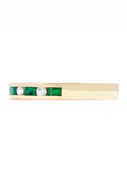 The Brasilica 14K Yellow Gold Emerald and Diamond Channel-Set Ring, 0.66 TCW, showcases alternating rectangular green emeralds and round white diamonds in a slim channel-set single row design.