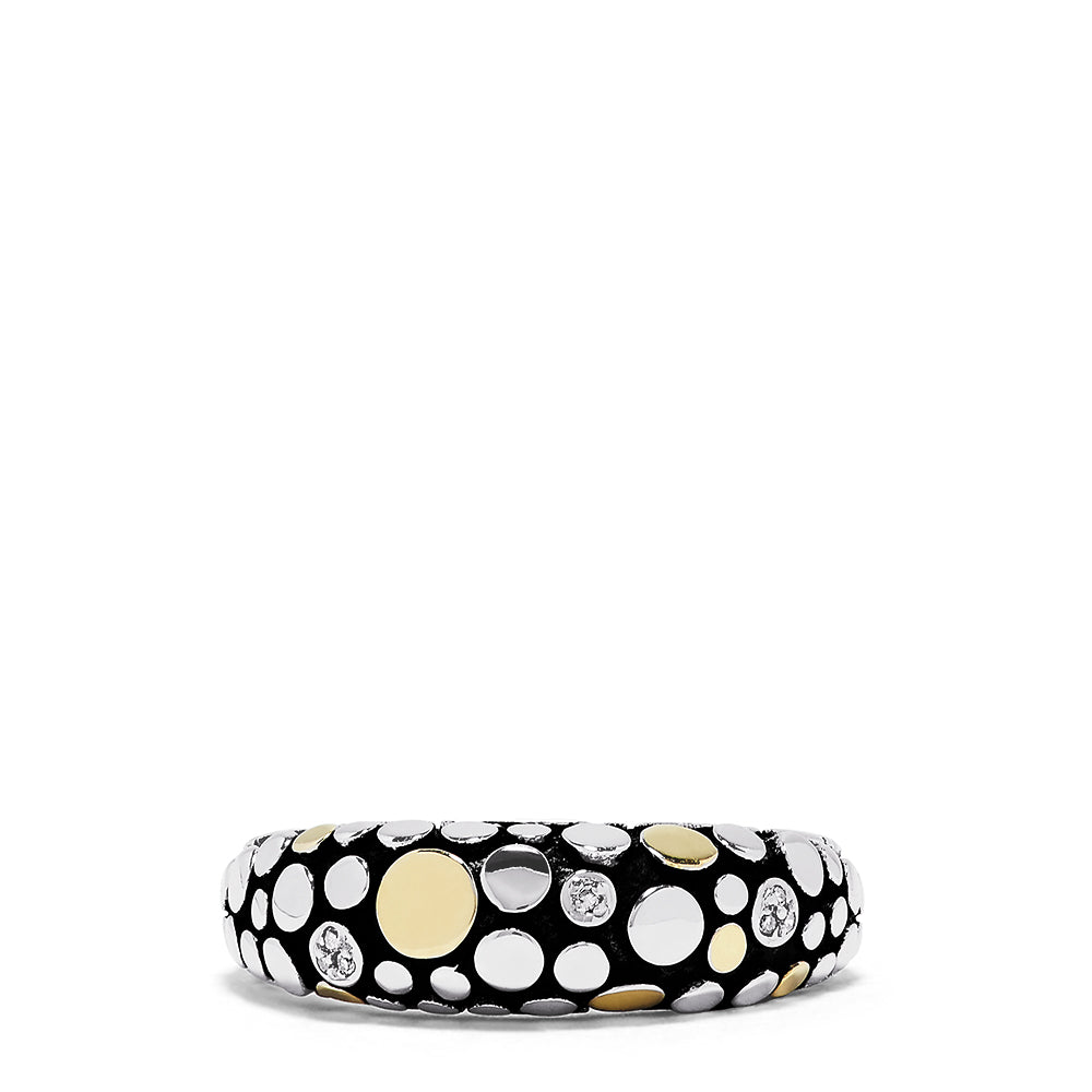 The 925 Sterling Silver & 18K Yellow Gold Diamond Accented Ring, 0.03 TCW, features a playful mix of gold and silver dots with sparkling diamonds for a modern look against a crisp white background.