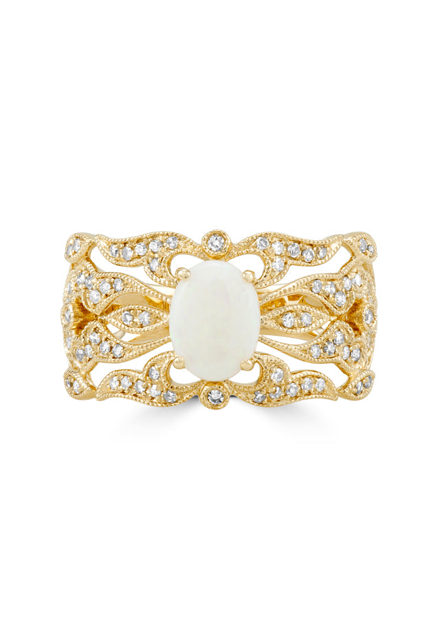 The Aurora 14K Yellow Gold Opal and Diamond Ring features an intricate filigree band, an oval opal center stone, and sparkling diamonds totaling 0.97 carats.