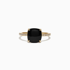 The Eclipse 14K Yellow Gold Diamond and Onyx Ring, 1.40 TCW, showcases a large cushion-cut black onyx set in four prongs on a slim gold band accented with sparkling white diamonds.