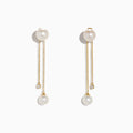 14K Yellow Gold Diamond and Fresh Water Pearl Drop Earrings (0.05 TCW), each with a pearl stud, a delicate chain with pearl drop, and a shorter chain set with a small round diamond, shown on a white background.