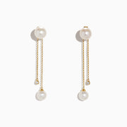 14K Yellow Gold Diamond and Fresh Water Pearl Drop Earrings (0.05 TCW), each with a pearl stud, a delicate chain with pearl drop, and a shorter chain set with a small round diamond, shown on a white background.