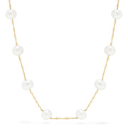 The 14K Yellow Gold Fresh Water Cultured Pearl 18 Necklace features evenly spaced round pearls with subtle variations, creating a simple, elegant look. Pearls are set on a delicate yellow gold chain and displayed against a plain white background.