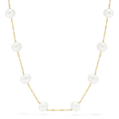 The 14K Yellow Gold Fresh Water Cultured Pearl 18 Necklace features evenly spaced round pearls with subtle variations, creating a simple, elegant look. Pearls are set on a delicate yellow gold chain and displayed against a plain white background.