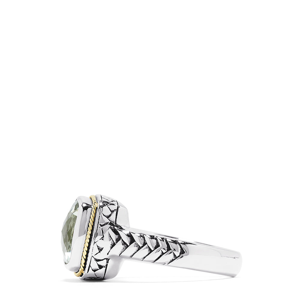 The 925 Sterling Silver and 18K Yellow Gold Green Amethyst Ring, 3.90 TCW, showcases a cushion-cut pale green gemstone bordered by yellow gold and set on textured sterling silver bands.