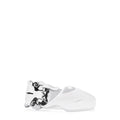 The Mens Sterling Silver Signature Panther Ring features an abstract, organic-shaped design with smooth curves and an asymmetrical form. This ring is shown against a plain white background.