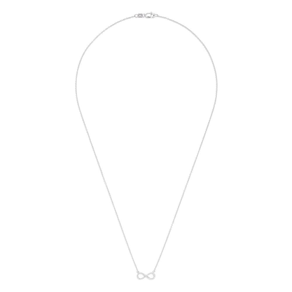 The Novelty 14K White Gold Diamond Infinity Necklace features a delicate infinity symbol pendant with 0.09 TCW diamonds, centered on a fine chain against a white background.