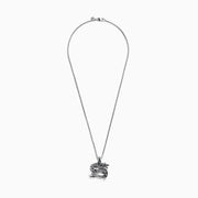 The Mens Sterling Silver Dragon Pendant features an intricately detailed dragon with textured scales, suspended from a box-link chain—a bold and captivating statement piece.