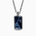 The Mens Sterling Silver Pietersite Dog Tag Pendant, 9.50 TCW, features a rectangular dog tag with a dark blue marbled pietersite stone set in an ornate silver frame on a sterling silver chain.
