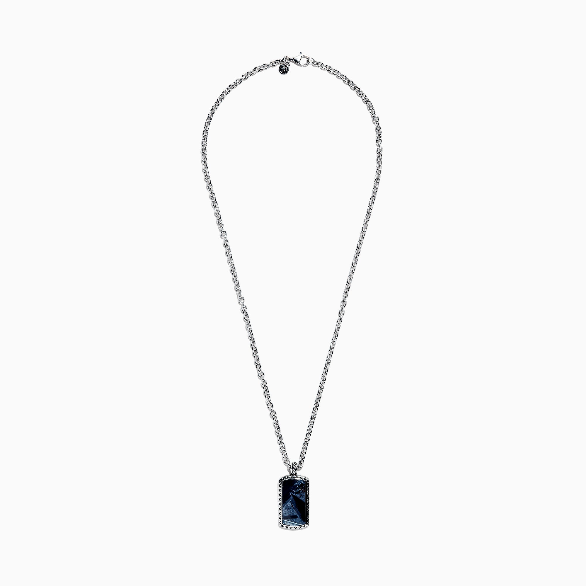 The Mens Sterling Silver Pietersite Dog Tag Pendant, 9.50 TCW, features a rectangular dog tag with a dark blue marbled pietersite stone set in an ornate silver frame on a sterling silver chain.